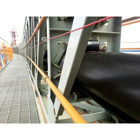 Tubular belt conveyor with robust construction